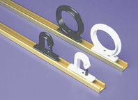 A pair of Track a Rod Holders Only on a purple background.