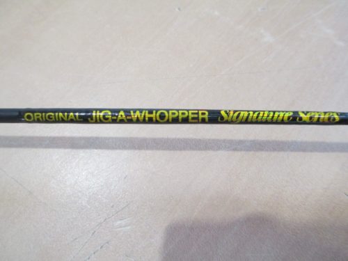 A golf club with the words HT Jig-A-Whopper 25" Rod on it.