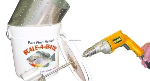 A person is holding a Scale-A-Matic with a drill attached to it.