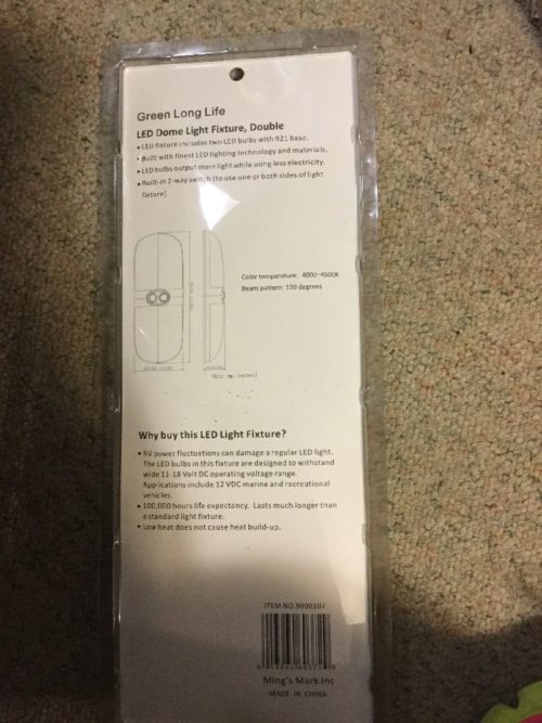 A package with an LED Dome Light Fixture inside of it.
