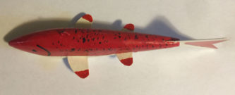 A 6-1/2 Inch Lamont Mounsdon Wood Spearing Decoy made out of paper.