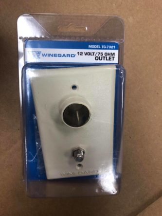 A white 12 volt outlet plus coaxial outlet in a package.