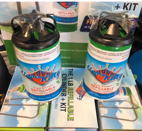 Two canisters of the Flame King Propane Refill Kit and 1lb Refillable Cylinder in a box.