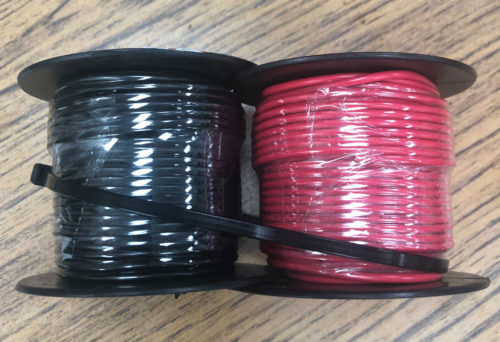 Two 16 GAUGE 100 FT RED BLACK WIRE INDIVIDUAL SPOOLS.
