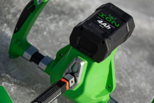 A green New !! Ion G2 8" or 10" 40 V Lithium Ion Auger with two 4 Ah Batteries with a handle attached to it.