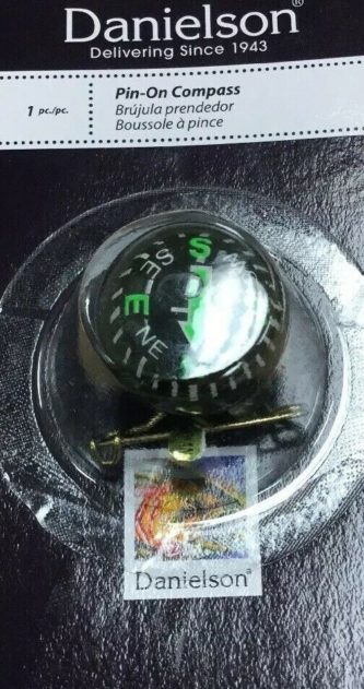 A Danielson Pin on Compass in a package.