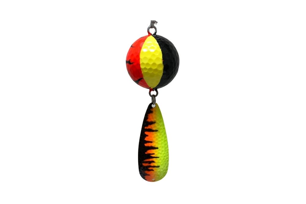 A NCS-007 Northern Crack Spearing Teaser Orange Black Yellow (Skyline) fishing lure hanging on a white background.