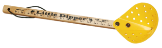 The Little Dipper Ice Scoop's ruler is sitting on a wooden surface.