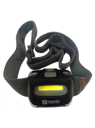 A Trophy Angler Headlamp 140 Lumen with a yellow light on it.