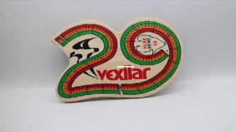 A wooden sign with the word Vexilar Cribbage Board on it.