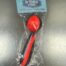 Red and black spearing teaser in packaging.